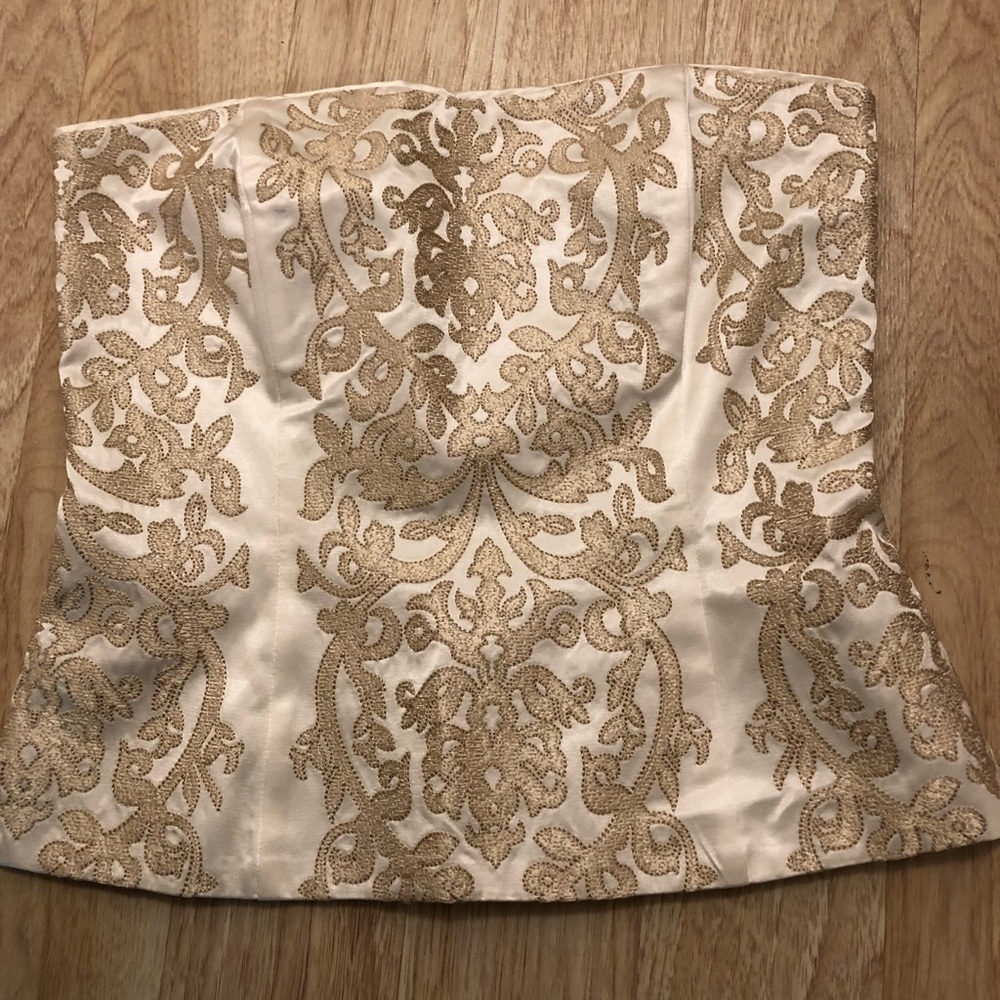 Stunning gold and white corset. Size 4 in perfect condition.